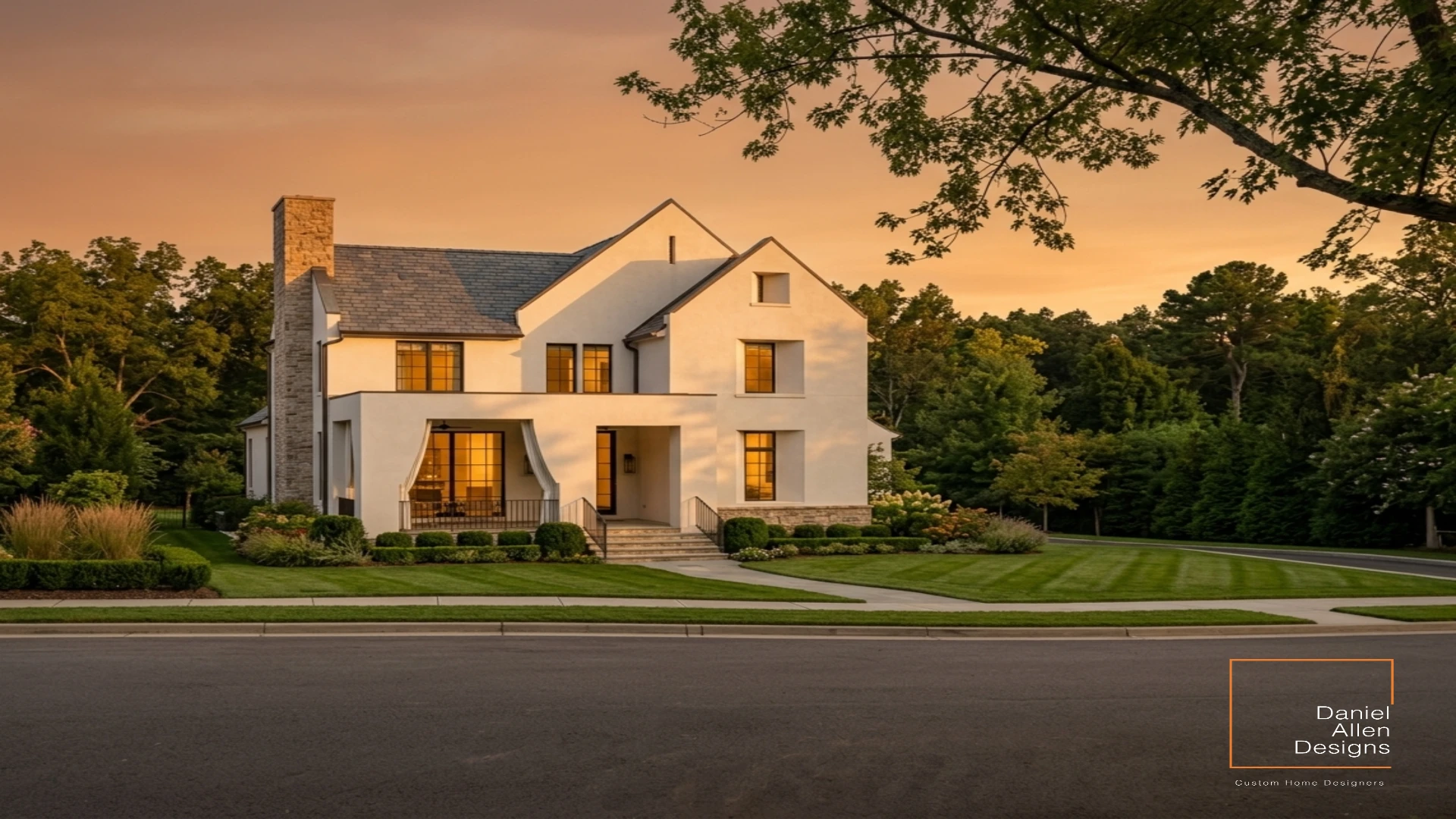 Daniel Allen Designs custom home in Virginia-Highland, Atlanta, Georgia — European stucco facade with covered porch, stone chimney, and sunset lighting