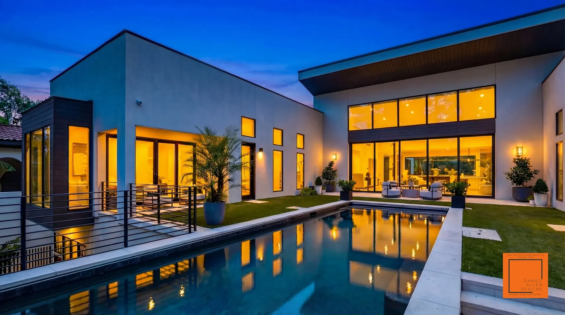 Daniel Allen Designs custom home design in Buckhead, Atlanta, Georgia — pool views with floor-to-ceiling windows and dusk lighting across the courtyard