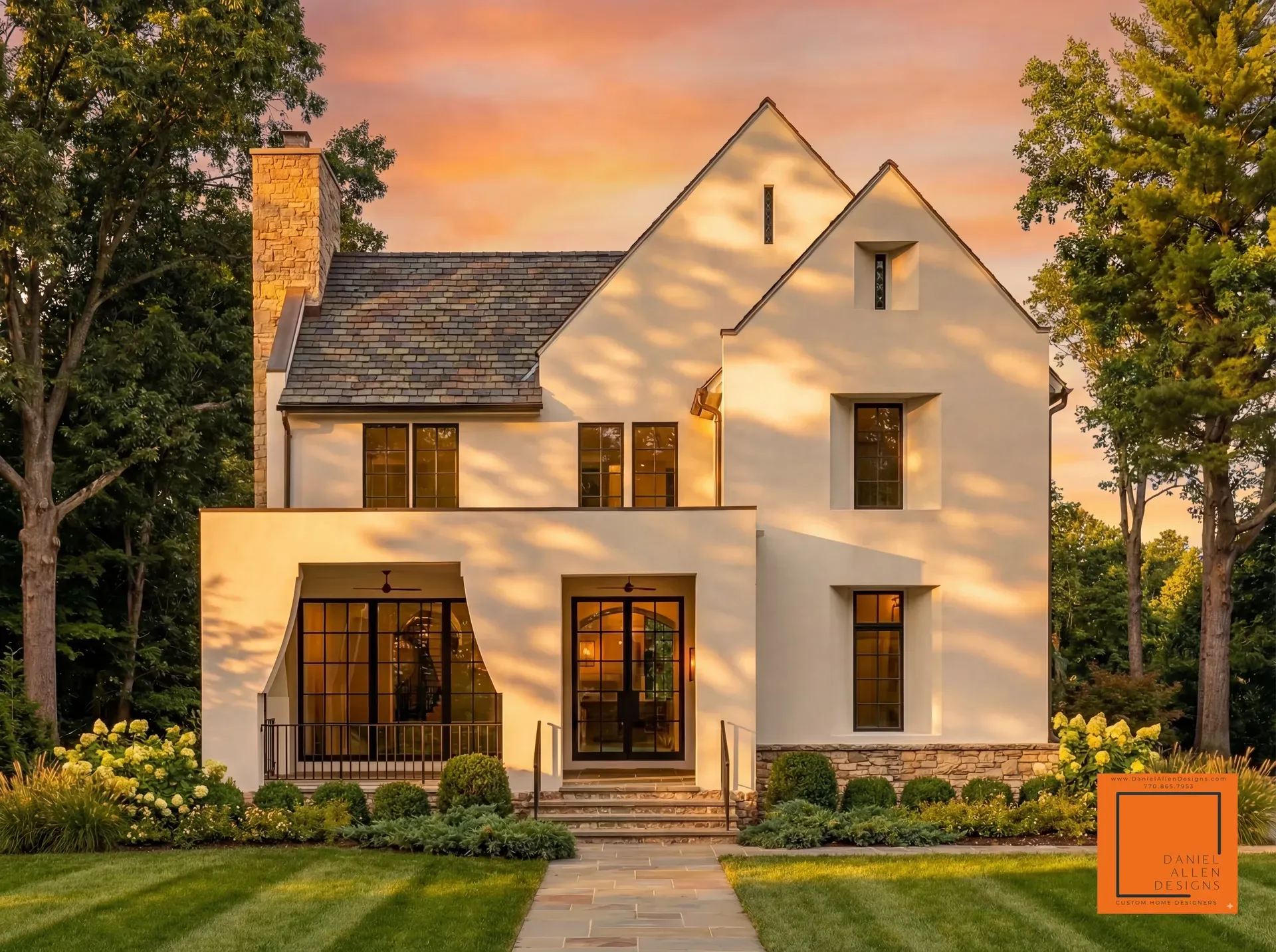 Daniel Allen Designs stucco estate custom home near Chastain Park, Atlanta, Georgia — white stucco facade with stacked-stone chimney and dark-frame windows