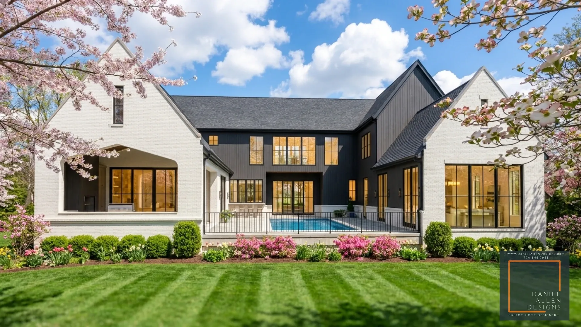 Daniel Allen Designs dark contemporary farmhouse variant in Milton, Georgia — dark board-and-batten siding with arched entryway and uplighting